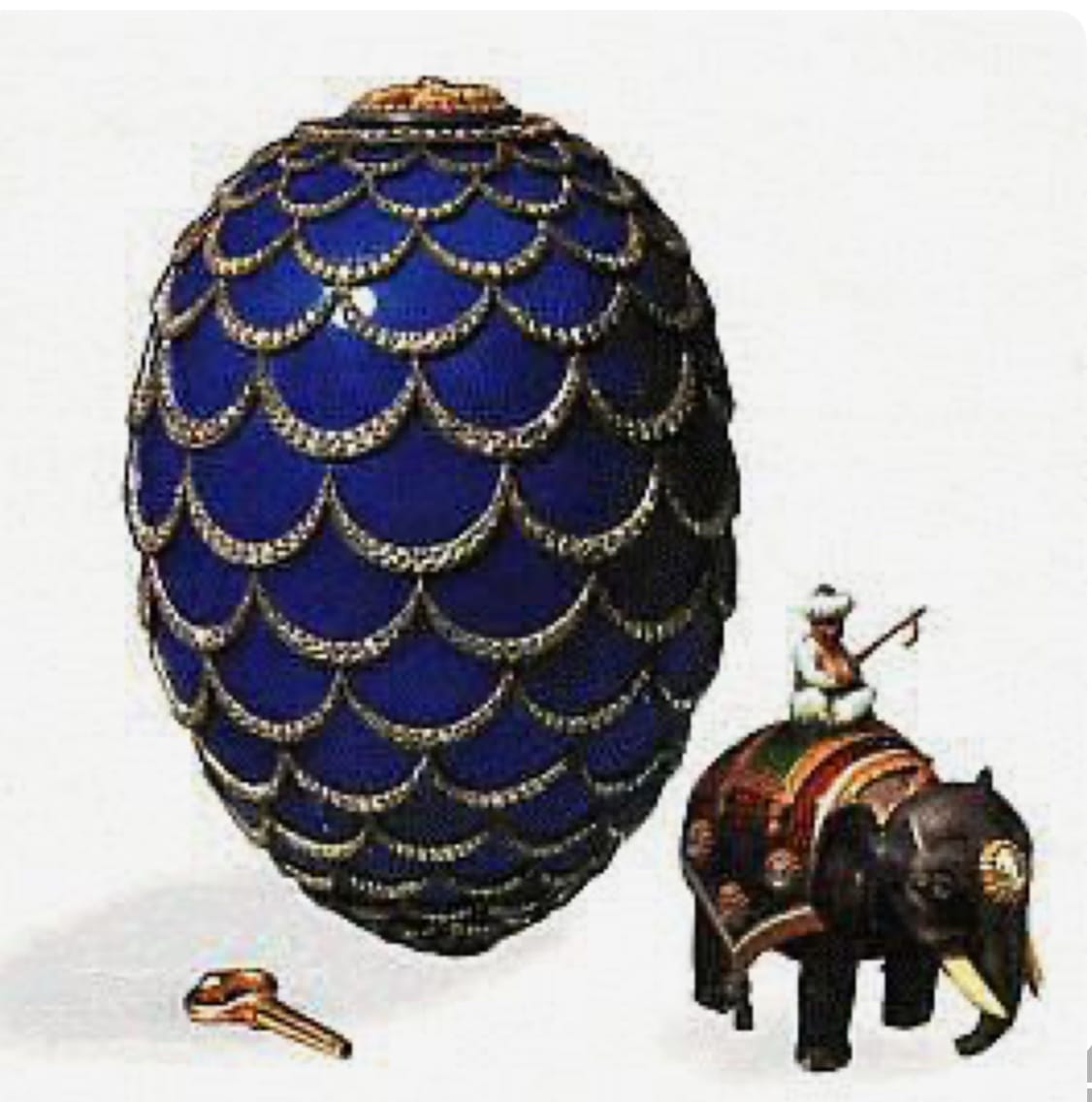 Срібна монета з серії faberge